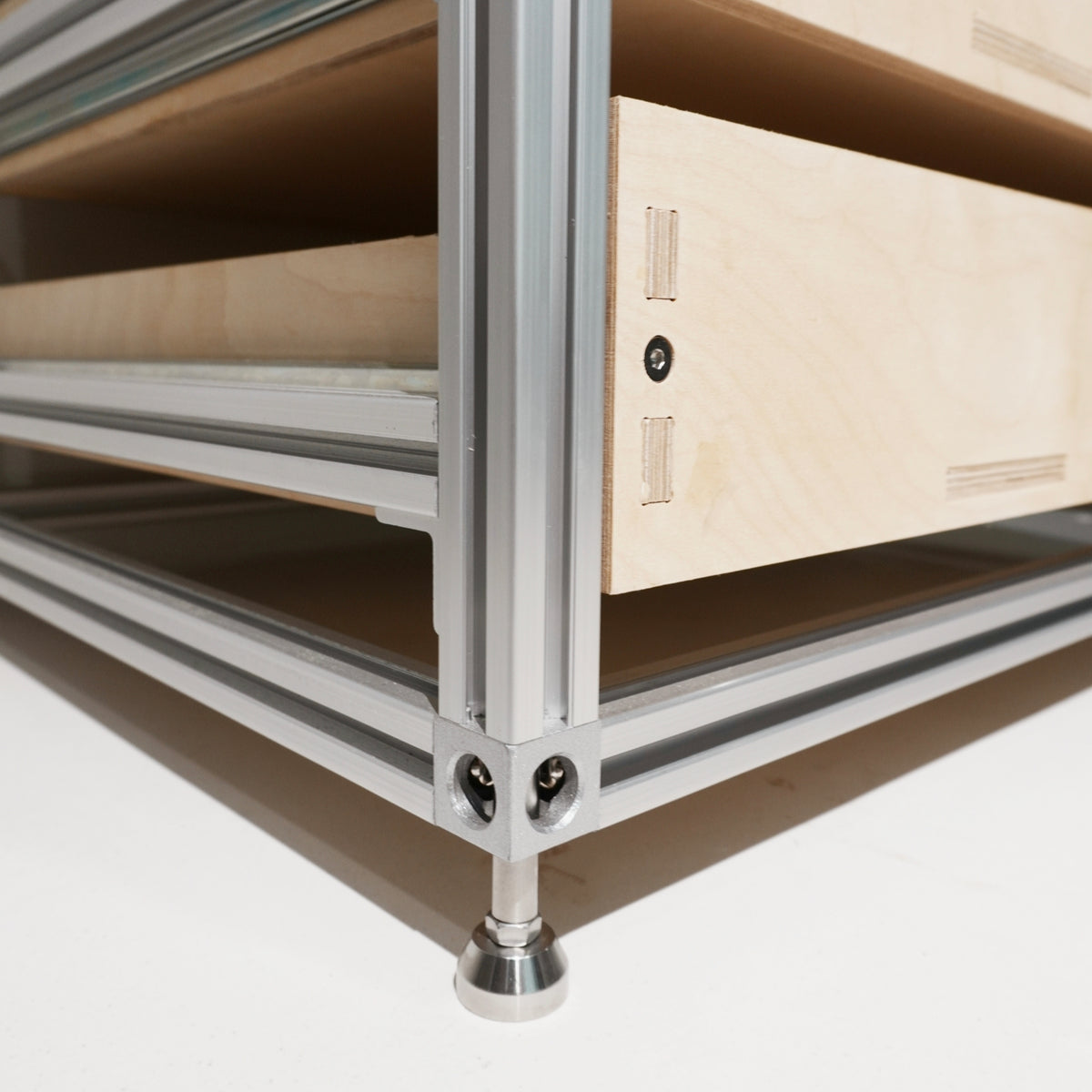 ModCab aluminium frame, birch drawer and adjustable foot detail